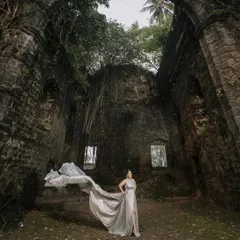 Looking incredible in our silver flying gown. This dress is perfect for a dramatic pre-wedding photoshoot, especially in a location with a lot of character.