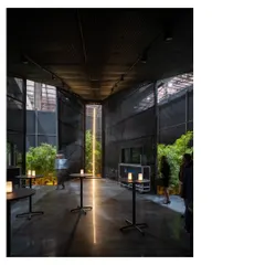 The Durall Systems Pavilion was a temporary build, an all-black mesh form connecting two extra-large minimal windows. It horizontally frames a garden, creating a space for quiet introspection.