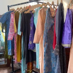 A shot of the costume rack for 'Unsorted'. A huge part of costume styling is organization, ensuring every outfit for every character is sourced, prepped, and ready for each scene.