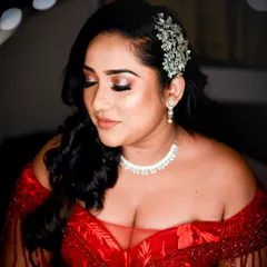 A stunning close-up of the bride, showcasing her flawless makeup, elegant hairstyle, and beautiful jewelry. I work to capture every detail that makes you feel special.