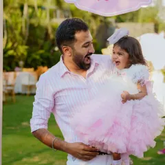 The pure, uninhibited laughter between a father and his daughter. Our goal is to capture the genuine connection and joy that fills the air during your family's special occasions. These are the candid moments you will look back on and smile about for years.