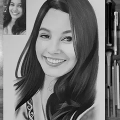 A beautiful smile captured in a detailed A4 black and white sketch. I use fine-tipped pencils and blending tools to create smooth skin tones and realistic hair texture.