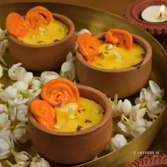 This might look like a delicious bowl of Jalebi and Rabdi, but it's actually one of my handmade soy wax candles. It's a perfect piece of desi decor flex that fills your room with a warm, festive fragrance.