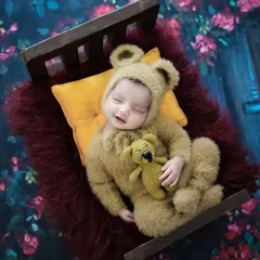Another angle of our popular teddy bear setup, this time with a tiny crocheted bear for the baby to hold.