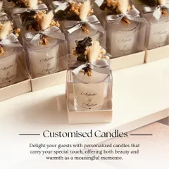 Delight your guests with these personalized candles. Each one is customized with the couple's names and elegantly packaged, offering a beautiful and warm memento of your special day.