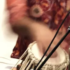 A motion-blur photo capturing the speed and energy of my hands during a fast-paced section of a performance. This shows the physical intensity required for complex classical pieces.