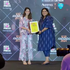 On stage receiving my award. A truly memorable moment that I will always cherish.