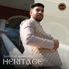Suits that speak your heritage. A real client looking proud and stylish in his custom-made beige Nehru jacket ensemble.