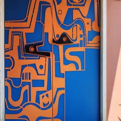 A detailed shot of the abstract, biomorphic handles we designed for this functional art door. Every component is crafted to be both an ergonomic part of the door and a sculptural element in its own right.