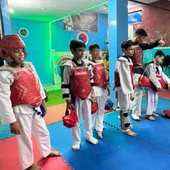 A line-up of my young fighters, ready for their drills. They are the future champions of our academy.