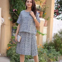 A beautiful co-ord set in a subtle grey floral print. Made from pure cotton, this outfit is perfect for brunch, a day out, or a casual evening.