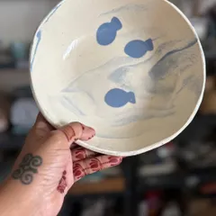 A beautiful bowl made using the Japanese Nerikomi technique, with soft, swirling colors like waves.
