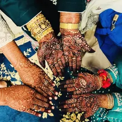 A group of hands showing off their beautiful, dark henna stains. It's so wonderful to see everyone happy with their results.