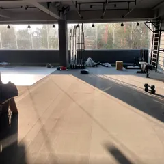 The morning sun hitting the floor at Troop HQ. I designed the space to be open and full of natural light, creating a calm and focused environment for training.