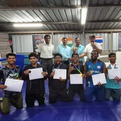 The winning team from the Bengaluru University Inter-college boxing event. Each fighter holding their certificate, a testament to their discipline and performance in the ring.