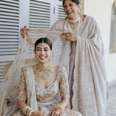 The mother of the bride helping her daughter with her veil. A truly precious moment. I gave her a timeless, elegant makeup look that made her feel confident and beautiful.