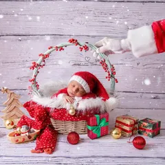 Santa's special delivery! This Christmas basket, complete with gifts and ornaments, is a magical way to celebrate your baby's first Christmas.