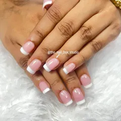 Another angle of the soft gel French manicure. The glossy top coat gives it a beautiful shine, and the craftsmanship ensures it will last for weeks.