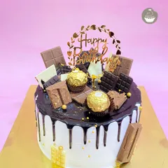 You can never have too much chocolate. My Chocolate Overload cake is pure indulgence, featuring a rich drip, and topped with an assortment of chocolates like Ferrero Rocher, KitKat, and Dairy Milk.