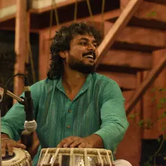 Enjoying the music while performing with Ustad Faiyaz Khan saheb at The Courtyard.