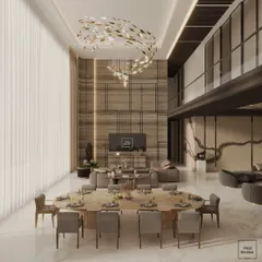 For this double-height penthouse, we designed a grand living and dining space that exudes sophistication. A magnificent, flowing chandelier acts as a sculptural centerpiece, drawing the eye upwards and highlighting the scale of the room.