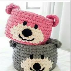 How cute are these hand-knitted crochet baskets? I make them from t-shirt yarn in fun animal designs, like these bears, to help organize your kids' room and make cleanup fun.