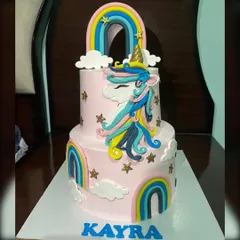 I love bringing magical themes to life, like this two-tiered unicorn cake for a special birthday girl. This custom eggless cake features colourful fondant rainbows, clouds, and a beautifully crafted unicorn, making it a dream come true for any kids' party in Gurgaon.