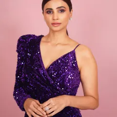 A close-up portrait of Daisy Shah, focusing on her expressive features and the intricate details of her makeup and styling. These shots are essential for an actor's portfolio.