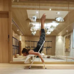 Using a chair for Shalabhasana (Locust Pose). Props can help you safely advance your practice, taking your body into a range it can't naturally hold and deepening your breath awareness.