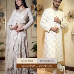 Elegance in monochrome. This couple shines in coordinated shades of silver mist and cream ivory, proving that subtle tones can make a powerful impact.