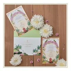 A new rendition of one of our favorite floral arch designs, this time for a naming ceremony. The lush tropical foliage and elegant script create a beautiful and celebratory announcement.