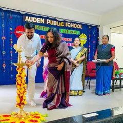 Participating in the lamp lighting ceremony at the school's investiture event. It's a privilege to be part of traditions that mark new beginnings and leadership.