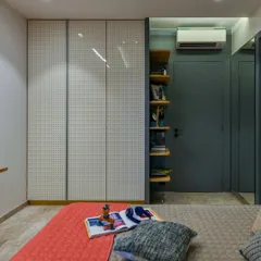 This playful room for two little brothers is bursting with happy energy. I balanced bright pops of sunflower yellow with calming grey for a look that's fun now and will grow with them.
