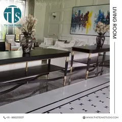 A look at a sophisticated living room we furnished. This space features our custom console tables with elegant metal-tipped legs, showcasing how we can create pieces that harmonize with a luxurious interior.