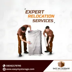 Our expert relocation services include meticulous packing. Here, our team is shown carefully wrapping a large appliance, demonstrating the professional care we take to protect your valuables.