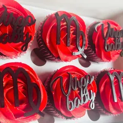 For the meticulous Virgo, I made these special red cupcakes. The design is clean and striking, with custom toppers celebrating a "Virgo baby" in style.