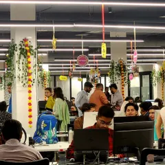 Even the main workspace was part of the celebration. I hung festive decor from the ceiling across the entire office floor, including marigold garlands and Bollywood-themed cutouts, ensuring everyone felt the festive energy right at their desks.