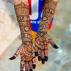 Another view of the full-arm kids' mehendi, which was personalized with the name "Zohan."