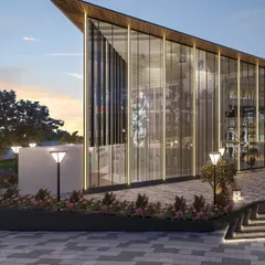 The entrance to the mall is marked by a dramatic, angled glass volume, creating a bold architectural gesture that draws visitors in.