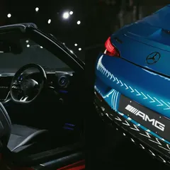 I focus on the details that define a luxury car. This diptych highlights the sleek interior of a convertible and the iconic AMG branding on a new Mercedes-Benz model, showcasing the craftsmanship and design.
