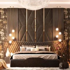 For this master bedroom, we crafted a sanctuary of opulence. A floor-to-ceiling, custom-quilted headboard with geometric brass inlays and integrated lighting creates a dramatic and sophisticated focal point, showcasing our expertise in bespoke bedroom design.