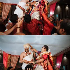 The fun and games of a South Indian wedding, as the bride and groom are lifted up by their families for the garland exchange. It's a moment of playful competition and joyous celebration.