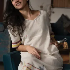 Showcasing a light and breezy summer dress by Designs by Pala. This demonstrates my versatility in modeling comfortable, elegant casual wear with a relaxed and approachable demeanor.