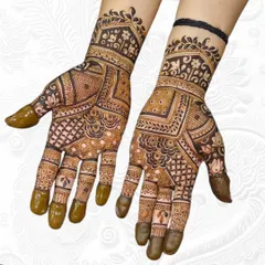 An intricate and dense Rajasthani-style mehendi perfect for Teej, with geometric patterns and fine line work.
