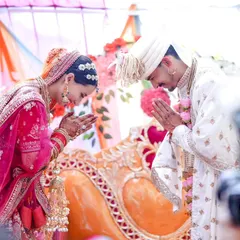 A beautiful moment from a Himachali wedding ceremony where the bride and groom greet each other with a traditional 'Namaste'. This captures the respect and love at the heart of the ritual.