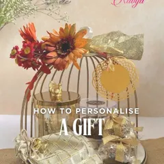 Personalizing a gift is what makes it truly special. This image shows a custom hamper in a gold cage, where I've added a personalized tag and curated items based on the client's preferences.