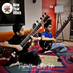 Young brothers practicing the sitar together at home, a journey that began with curiosity at one of our workshops. We aim to plant a seed of interest that can grow into a lifelong passion.