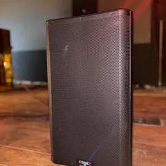 The QSC K12.2 active speaker, a powerhouse of sound we installed for a club in Delhi. This speaker delivers clear, punchy audio that can fill a room without distortion, crucial for both live music and DJ sets.