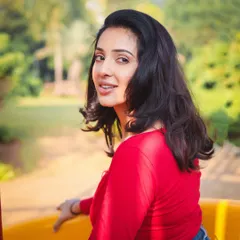 A bright and sunny outdoor portrait. This kind of shot is great for a portfolio, showing a model's natural beauty and approachable charm in a casual setting.