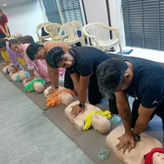 Here I am practicing chest compressions on an adult manikin during my Basic Life Support training. Hands-on practice is crucial for mastering life-saving skills and ensuring I can respond effectively in an emergency.